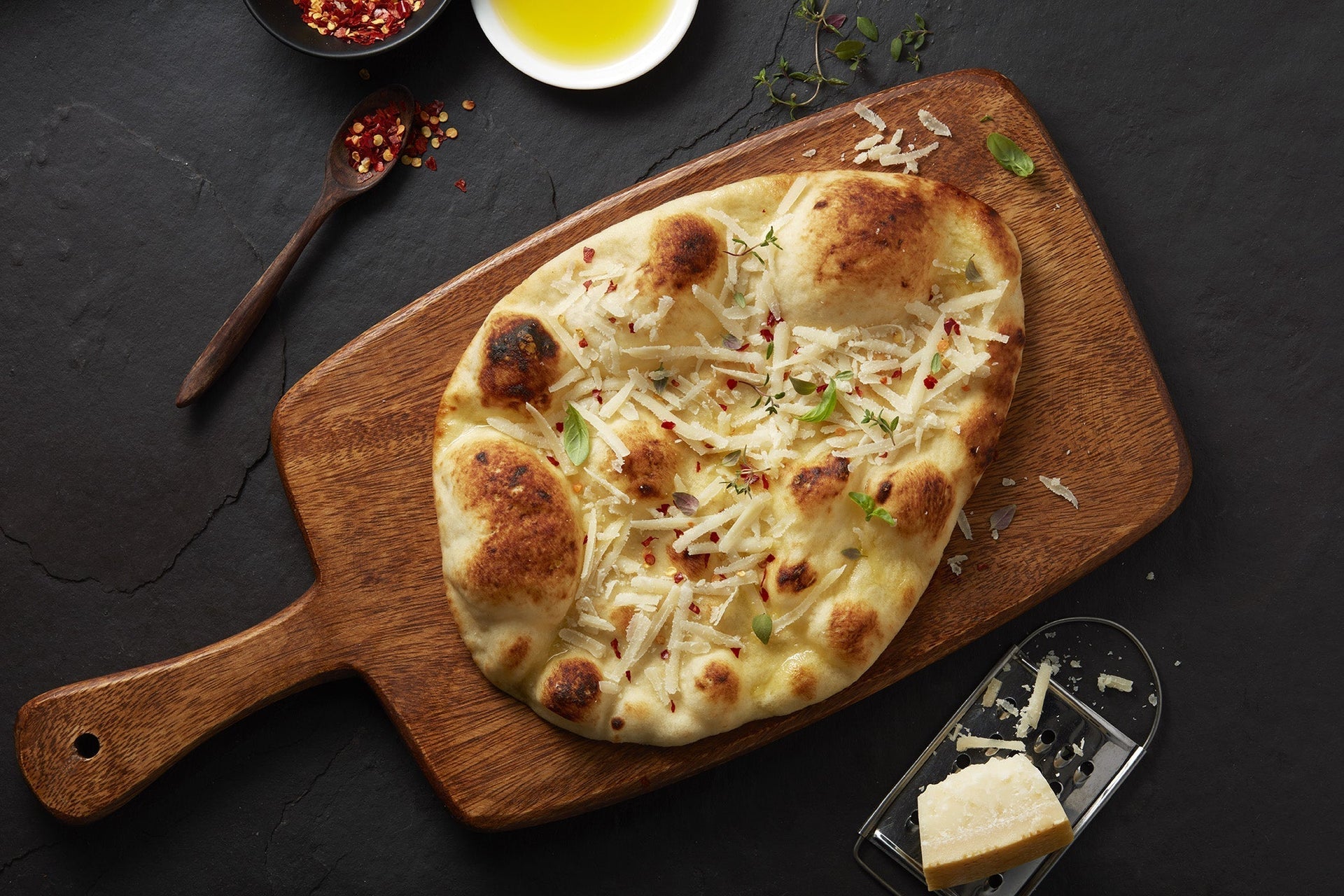 Warm Naan Topped with Olive Oil and Cheese