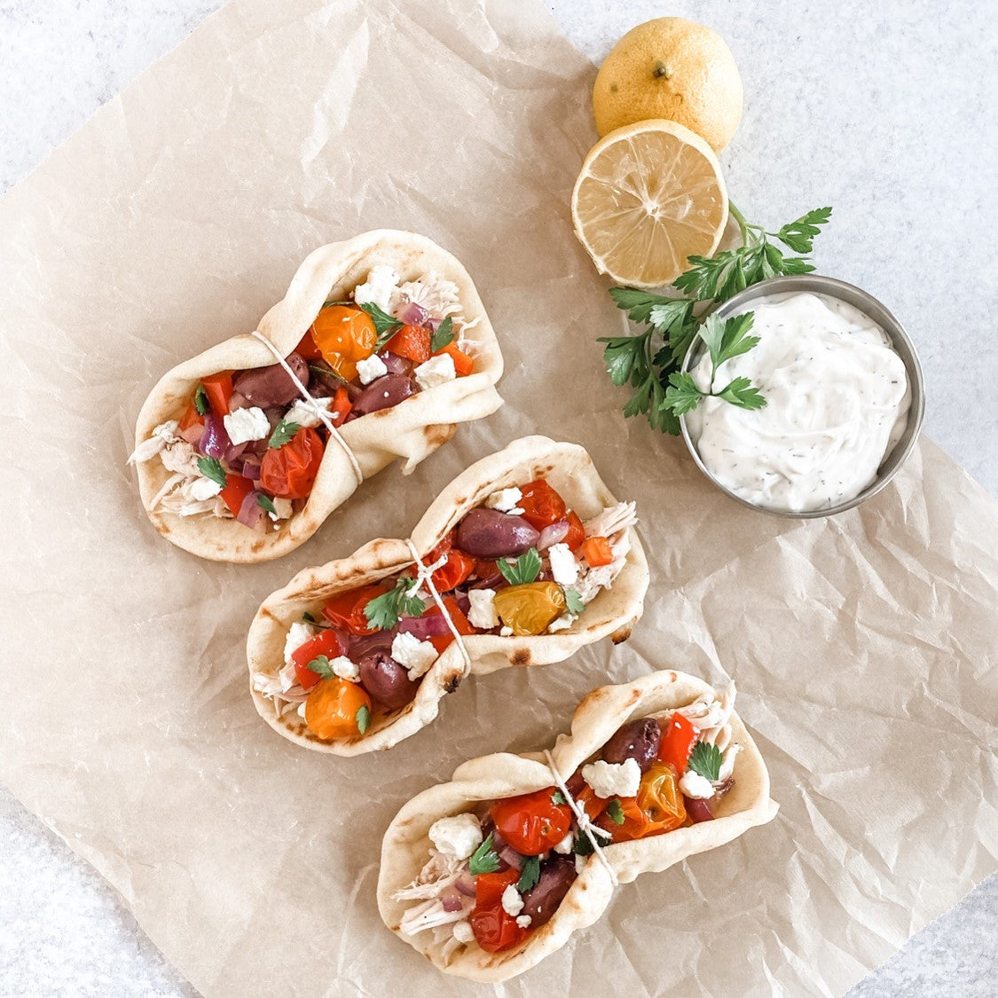 Sheet Pan Mediterranean Chicken Naan Wraps