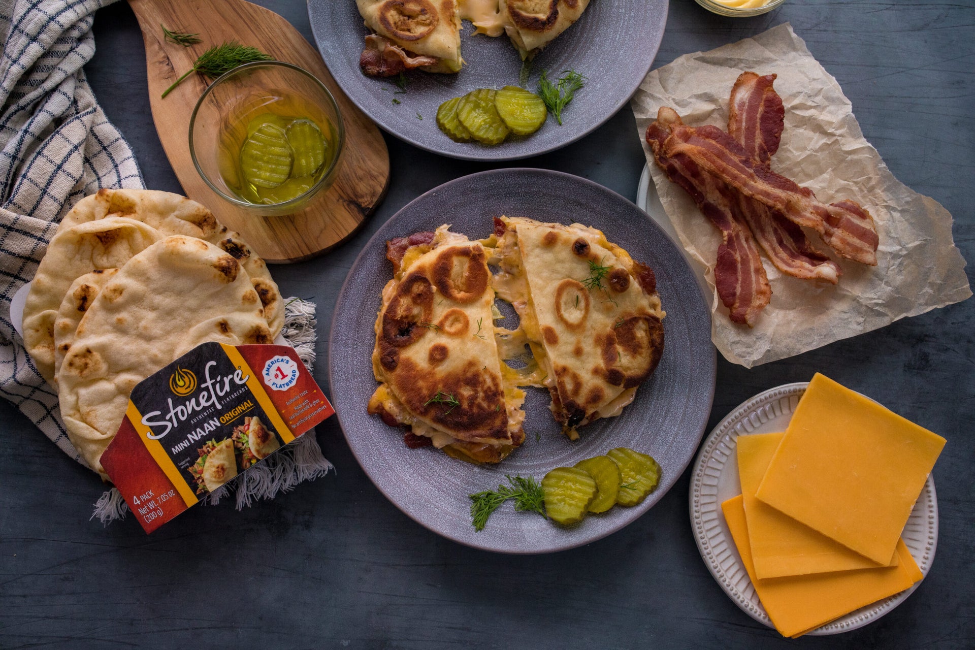 Stonefire Naan Grilled Cheese with Dill Pickle, Cheddar, and Bacon
